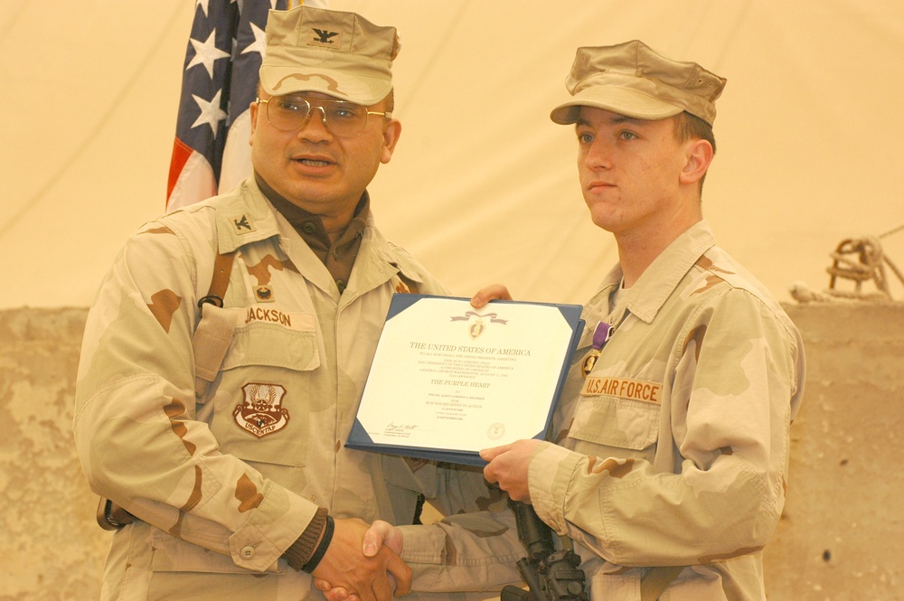 Purple Hearts, Defense of Freedom medal presented to Airmen, Civ