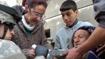 Image 19: Black Jack Brigade troops deliver food, water to residents on Haifa Street