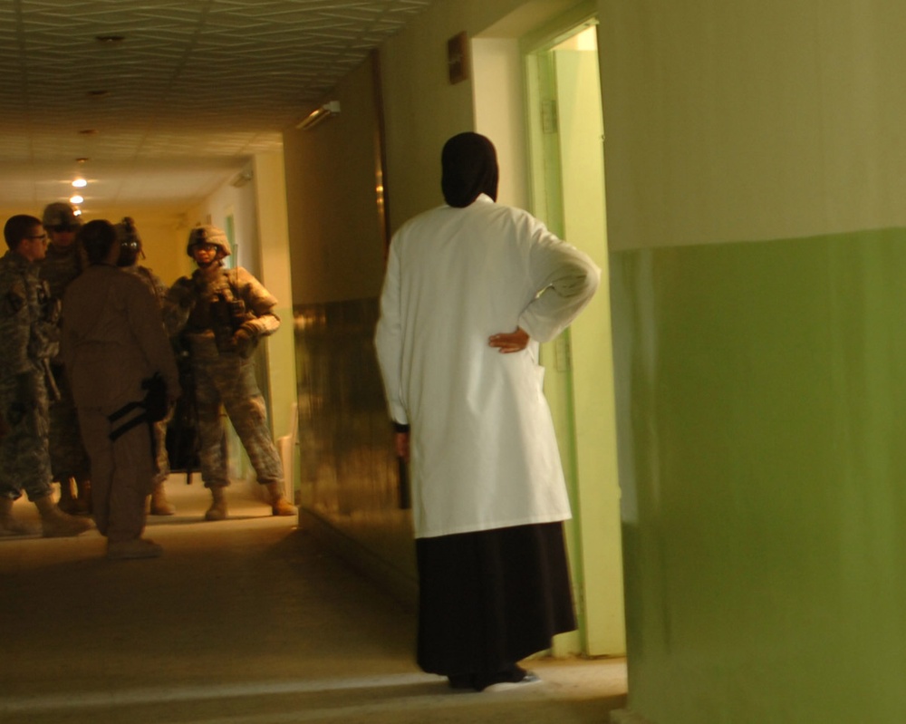 Soldiers Work With Iraqis to Provide Medical Care to Citizens of Sab Al Bor