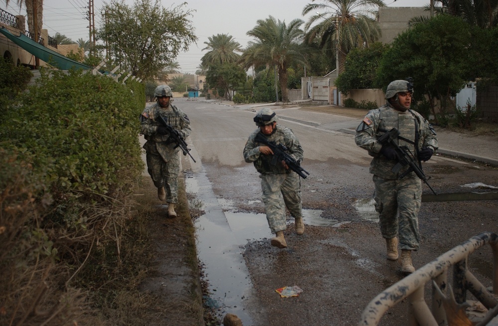 U.S. Soldiers Search for Insurgent Activity