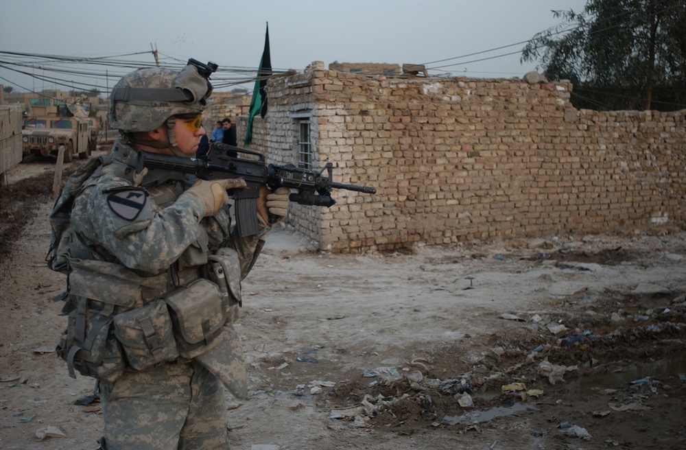 U.S. Soldiers Search for Insurgent Activity