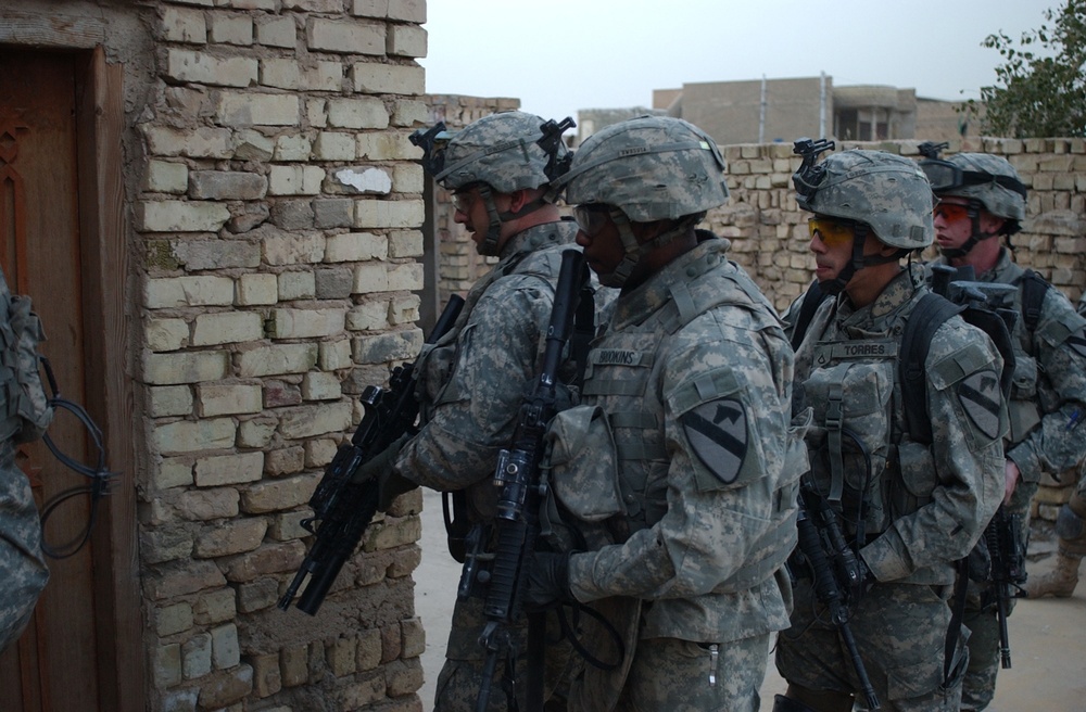 U.S. Soldiers Search for Insurgent Activity