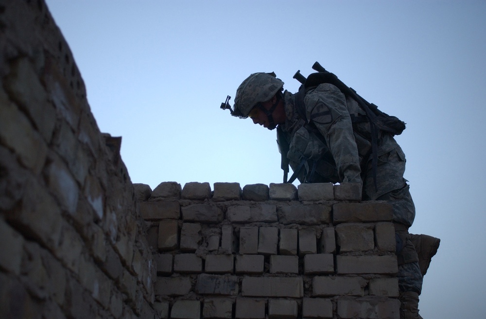 U.S. Soldiers Search for Insurgent Activity