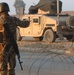 Iraqi Security Forces Work With U.S. Troops at Traffic Control Point