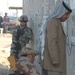 Iraqi Security Forces Work With U.S. Troops at Traffic Control Point