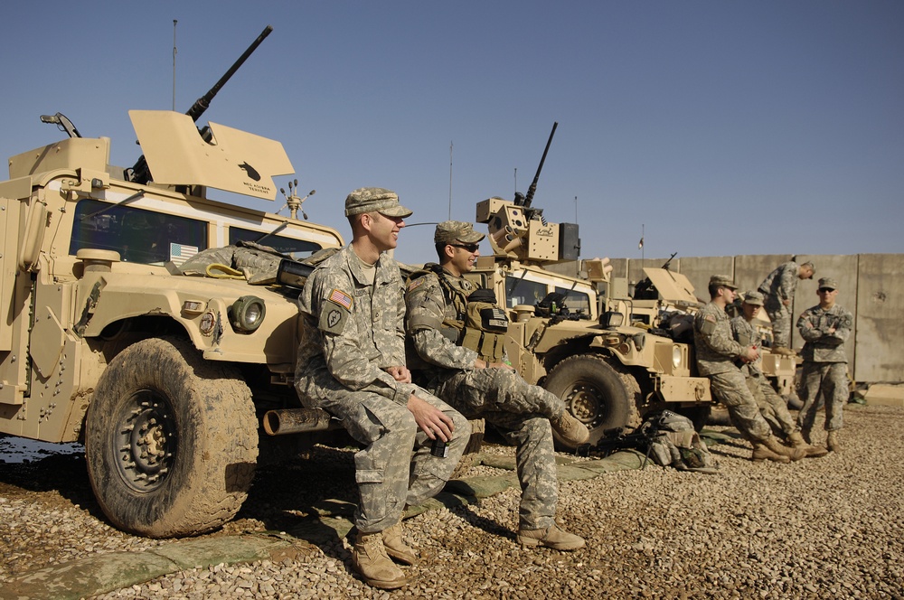 Iraqi army troops lead a patrol