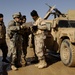 Iraqi army troops lead a patrol