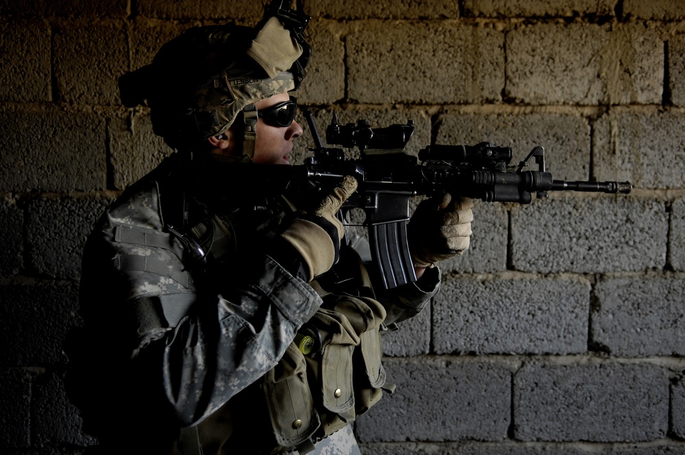 Iraqi army troops lead a patrol