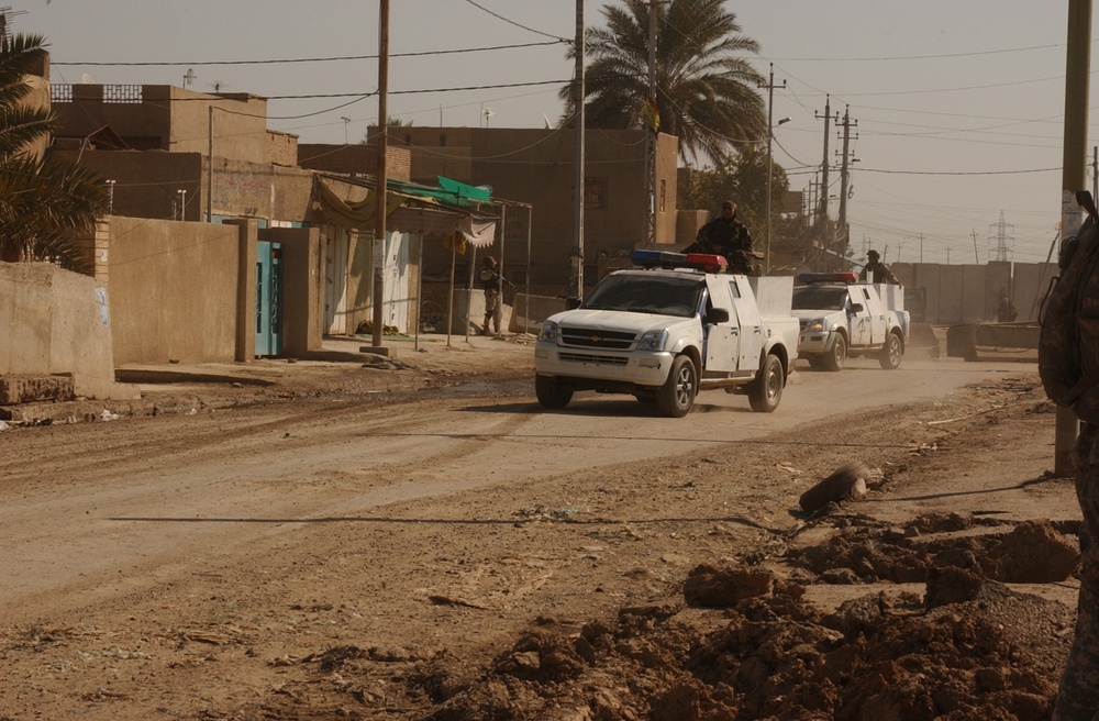 Iraqi and U.S. forces conduct cordon and search operations