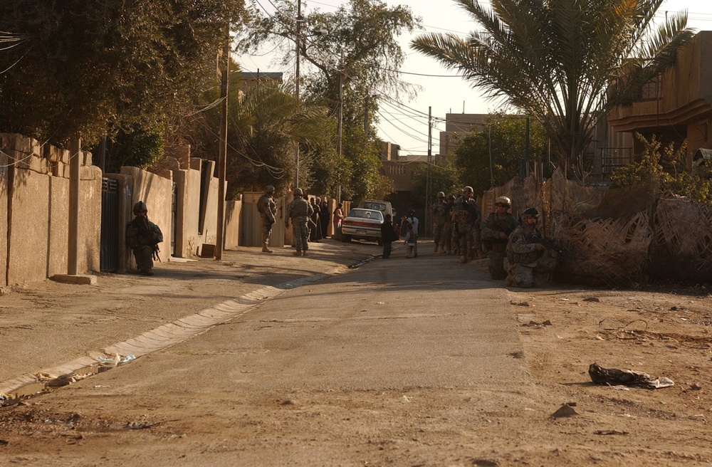 Iraqi and U.S. forces conduct cordon and search operations