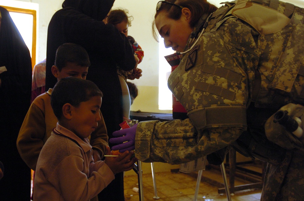 Soldiers offer health and dental care to village residents