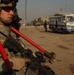 Iraqi police and U.S. Soldiers conduct a cordon and search