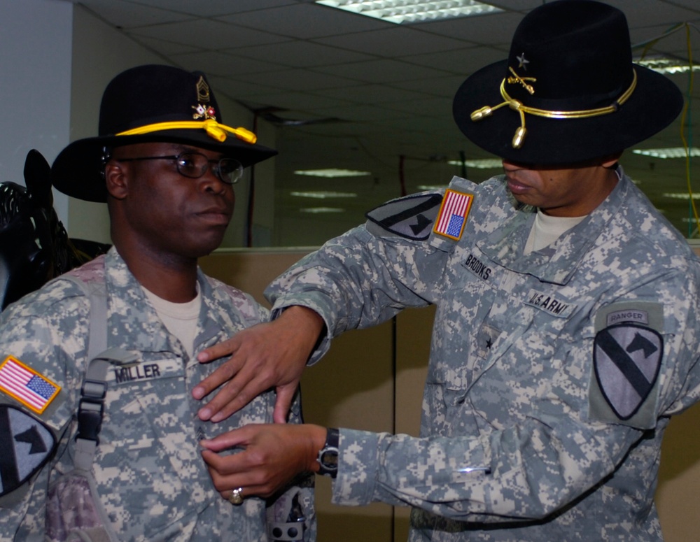 Troop Keeps Soldiering After 21 Years