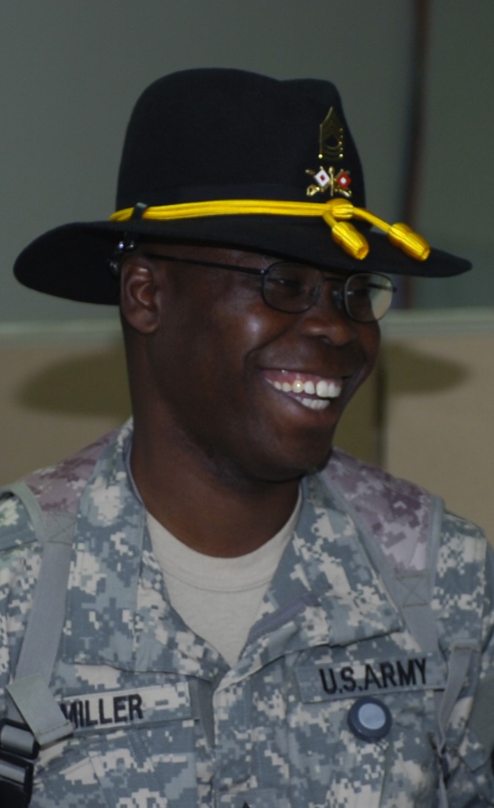 Troop Keeps Soldiering After 21 Years