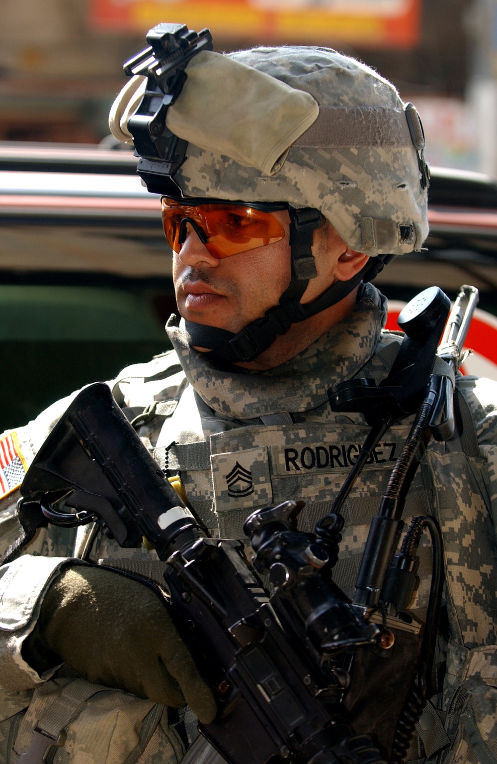 Soldiers speak with locals in Samarra