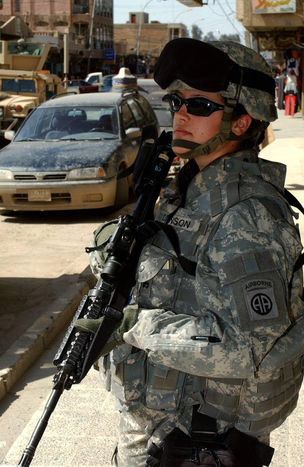 Soldiers speak with locals in Samarra