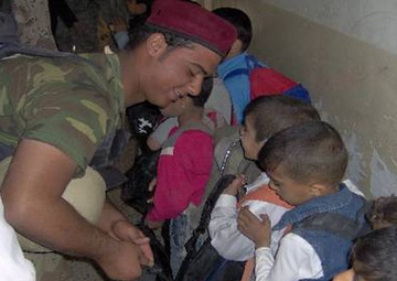 National Police, MND-B Soldiers drop off school supplies