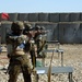 Mongolian soldiers fire Makarov pistols during competition