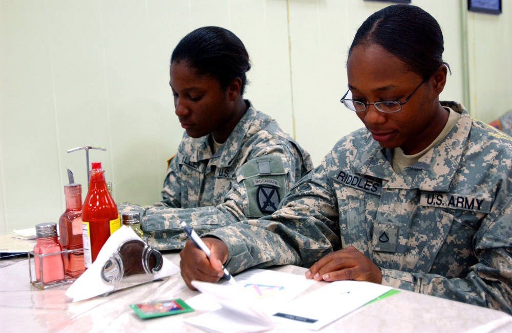 Soldiers celebrate women's achievements