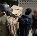 Fallujah police hands out school supplies