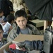 Fallujah police hands out school supplies