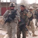 U.S. Army, Iraqi soldiers patrol streets in Mosul