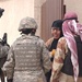 1st Cav. Div. Soldier questions Iraqi woman in Mosul