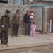 Iraqi police, U.S. Soldiers patrol neighborhood in Mosul