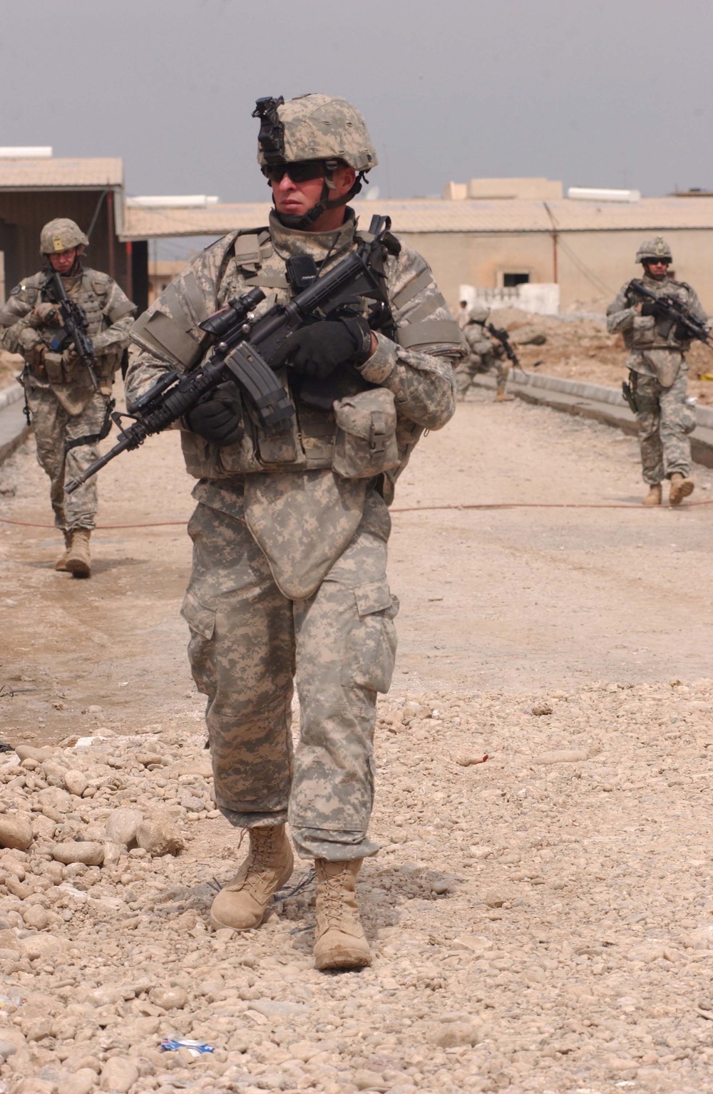 U.S. Army Soldiers, Iraqi police patrol streets in Mosul