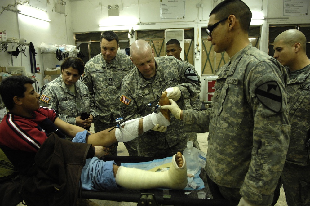 6th Squadron, 9th U.S. Cavalry medics treat wounds at FOB Normandy