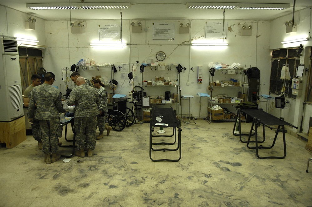 6th Squadron, 9th U.S. Cavalry medics treat wounds at FOB Normandy