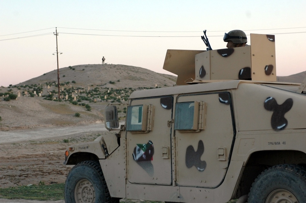 Iraqi army tests new equipment, scours village for buried cache