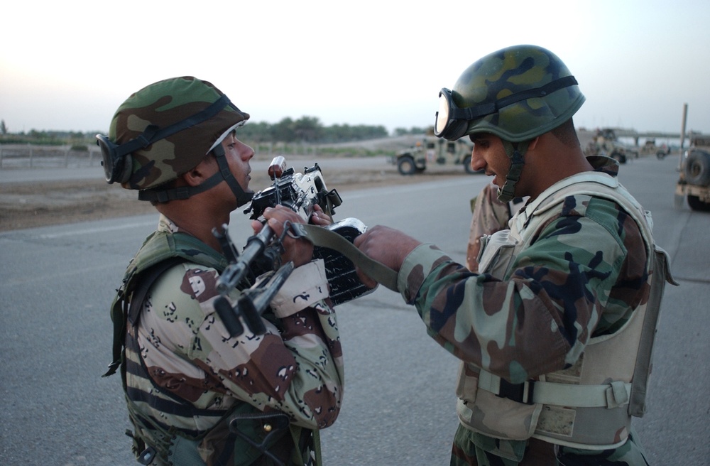 Searching for signs of insurgents in Lutafiyah