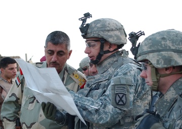 Searching for signs of insurgents in Lutafiyah