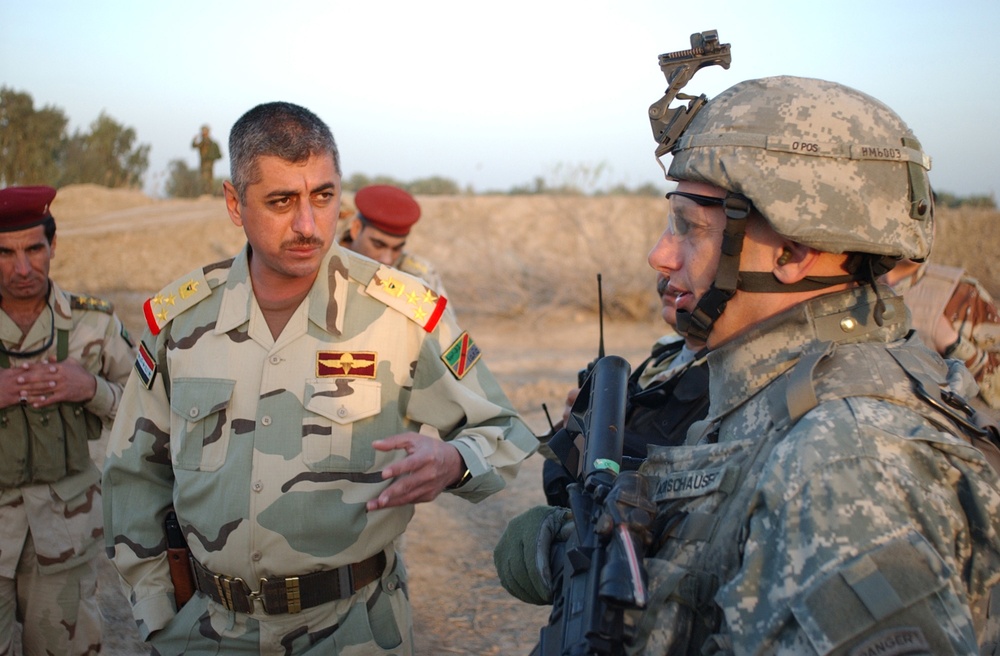 Searching for signs of insurgents in Lutafiyah