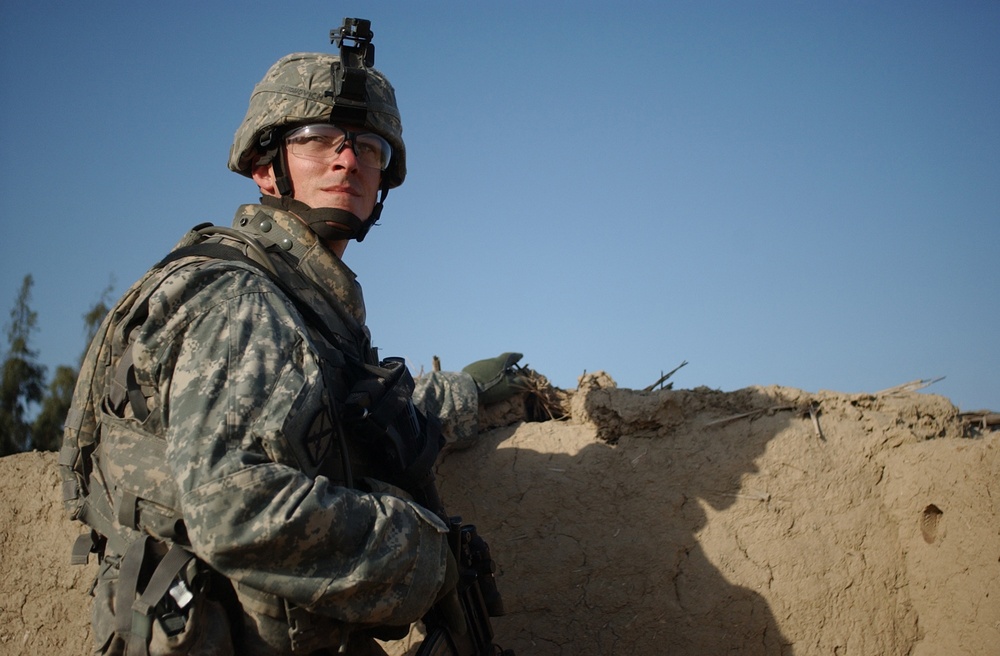 Searching for signs of insurgents in Lutafiyah