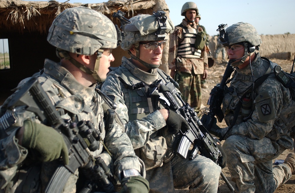 Searching for signs of insurgents in Lutafiyah