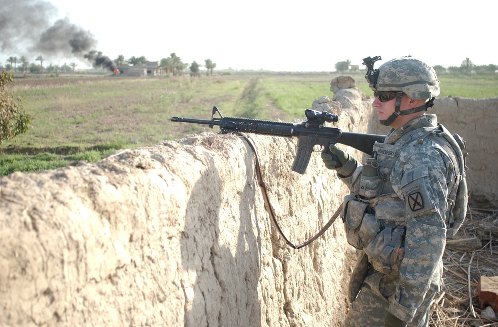 Searching for signs of insurgents in Lutafiyah