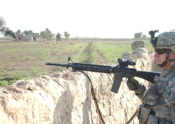 Searching for signs of insurgents in Lutafiyah