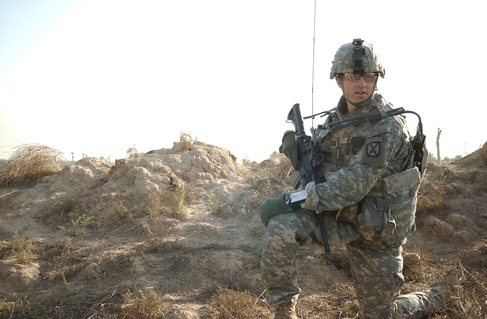 Searching for signs of insurgents in Lutafiyah