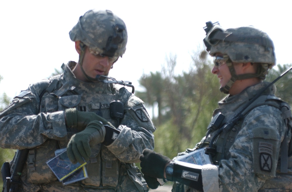 Searching for signs of insurgents in Lutafiyah