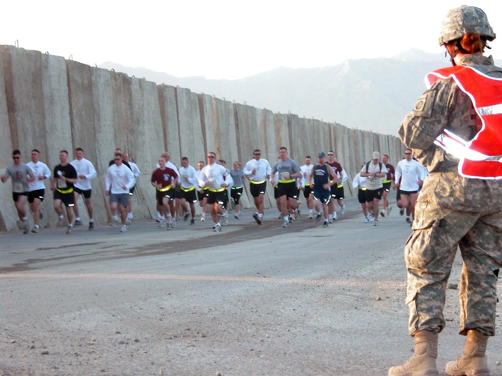 Service members compete in marathon from half-way around world