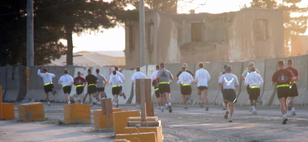 Service members compete in marathon from half-way around world