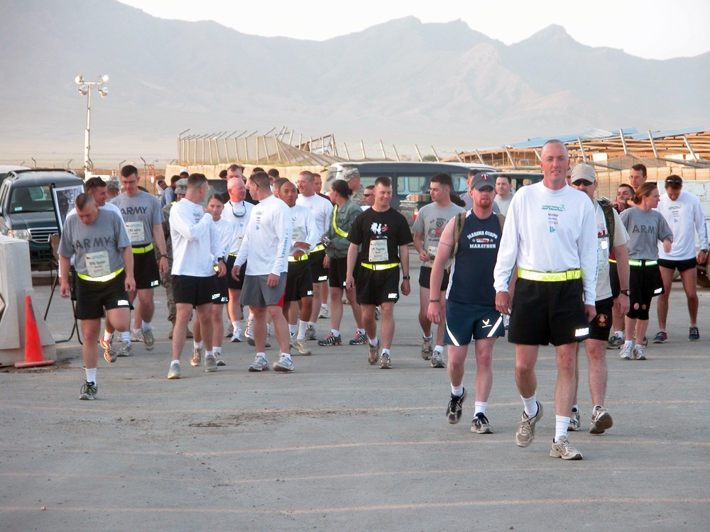 Service members compete in marathon from half-way around world