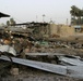 Patrolling the marketplace after an attack in Saqlawiyah