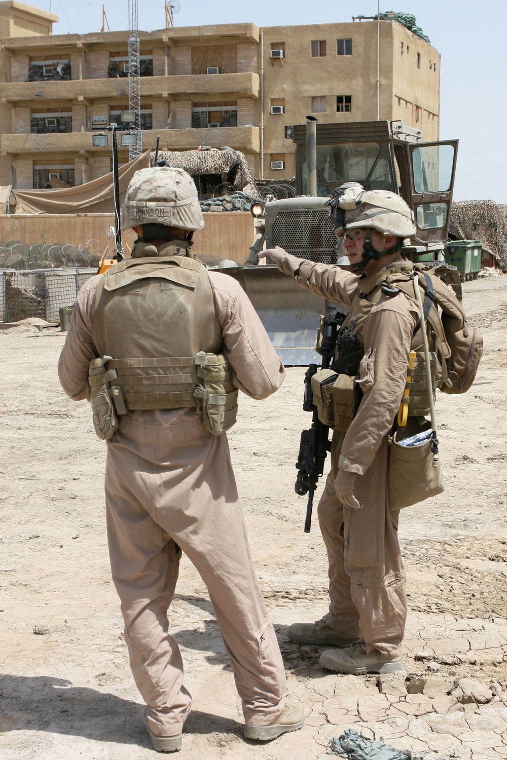 Patrolling the marketplace after an attack in Saqlawiyah