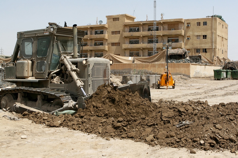 Patrolling the marketplace after an attack in Saqlawiyah