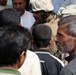 Patrolling the marketplace after an attack in Saqlawiyah