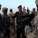 Soldiers look after Iraqis following insurgent attack