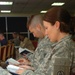 At Camp Buehring, Soldiers pray before heading into Iraq